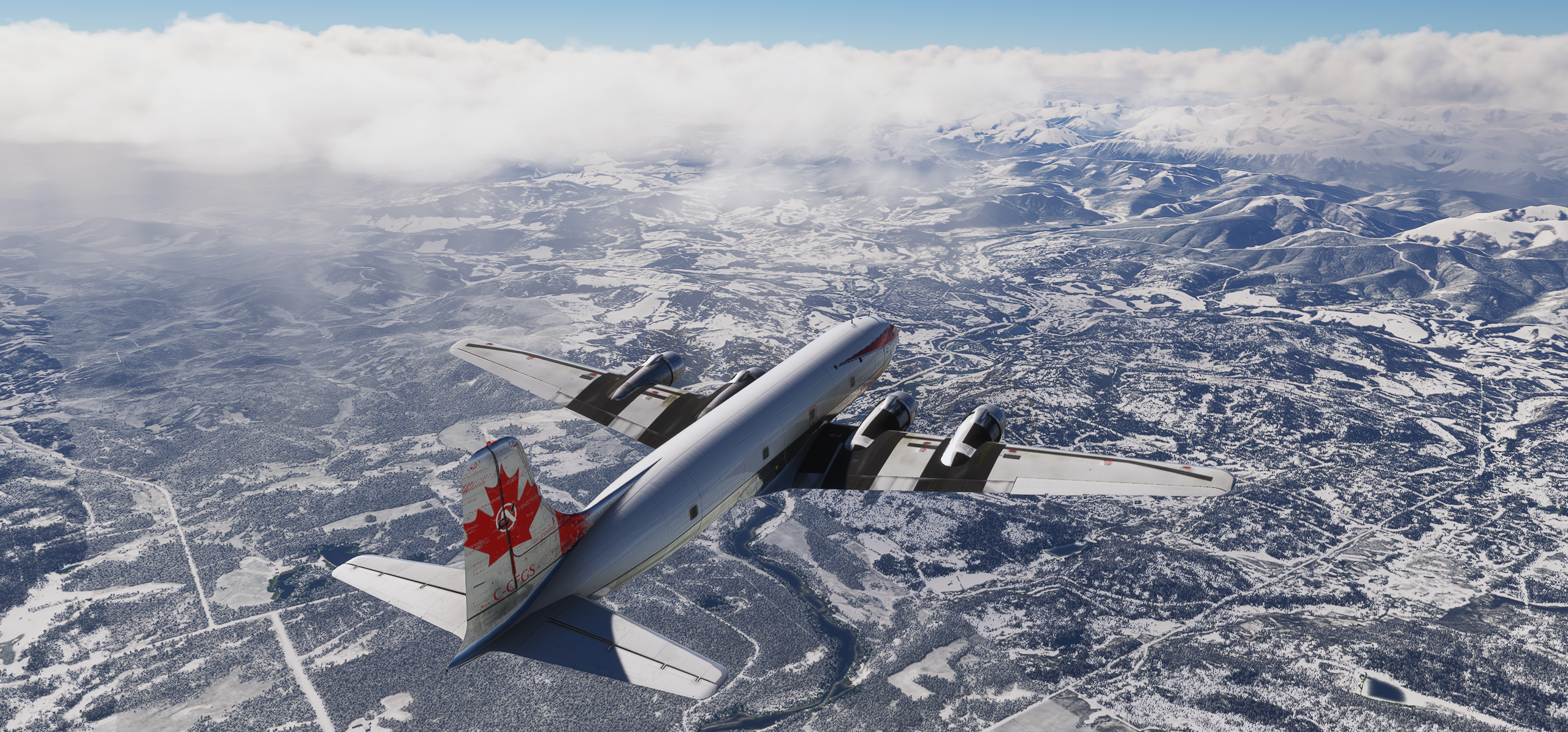 Classic aircraft flying over snowy terrain